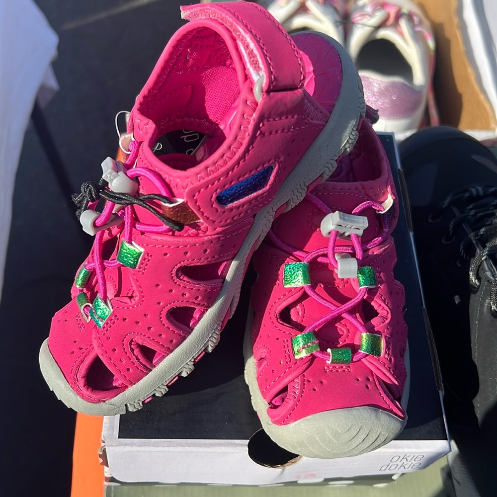 New in box. Okie Dokie hot pink water sandals with Velcro back